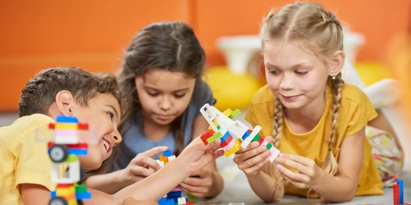 Child Care Guide - Young Children Enjoying Learning Through Play